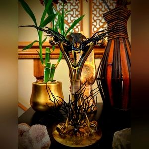 Genuine black and gold hand painted cat skull on vintage brass stand